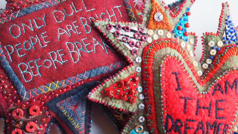 Motto Cushions